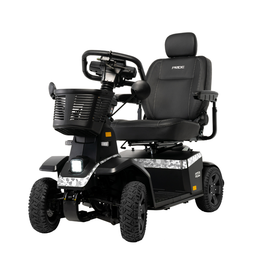 The Pride Mobility PX4 HD Bariatric Scooter offers a 500 lb weight capacity, padded seat with armrests and headrest, handlebars, front basket, rugged tires, and camo-patterned trim along the sides.
